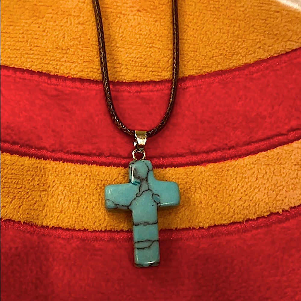 🐬New! Turquoise cross on leathery string 10 1/2”
